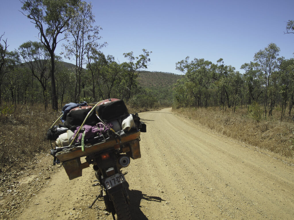 dry tropics dirt road, traveller, Italo Giardina